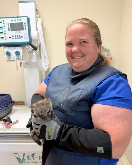 Texas West Animal Health Staff holding a fox